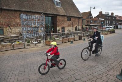 father and son cycling in Kings Lynn